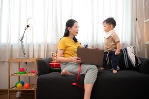While in vacation at home, a mother engages in activities with little kid,77 photo