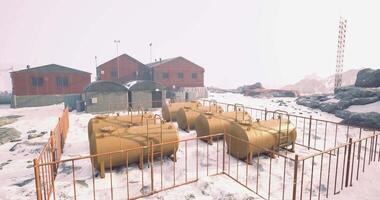 CGI Exploring industrial sites in a snowy remote landscape by day video