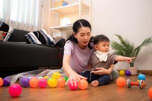 While in vacation at home, a mother engages in activities with little kid,8 photo