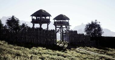 CGI Wooden towers guard ancient forts in a serene landscape video