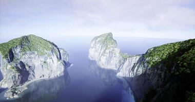 CGI Scenic view of rocky islands surrounded by calm ocean waters video