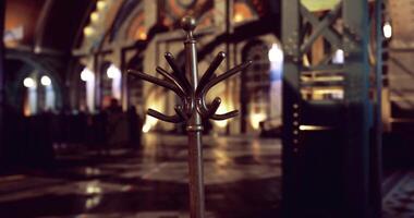 CGI Vintage coat rack stands in a grand hallway with intricate architecture video