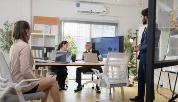 In a contemporary office, a group of senior executives with a mission to approve new projects,202 photo