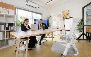 In a contemporary office, a group of senior executives with a mission to approve new projects,196 photo
