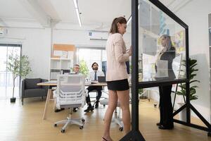 In a contemporary office, a group of senior executives with a mission to approve new projects,167 photo