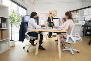 In a contemporary office, a group of senior executives with a mission to approve new projects,163 photo