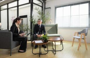 In a contemporary office, a group of senior executives with a mission to approve new projects,160 photo