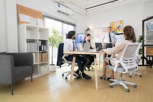 In a contemporary office, a group of senior executives with a mission to approve new projects,147 photo