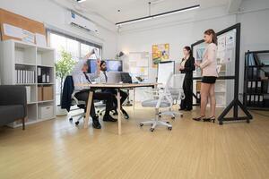 In a contemporary office, a group of senior executives with a mission to approve new projects,135 photo