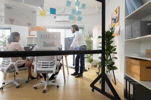 In a contemporary office, a group of senior executives with a mission to approve new projects,133 photo