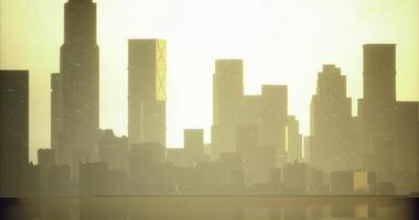 CGI Silhouetted city skyline at sunset with warm hues and soft light effects video