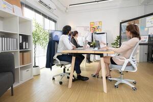In a contemporary office, a group of senior executives with a mission to approve new projects,123 photo