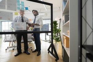 In a contemporary office, a group of senior executives with a mission to approve new projects,116 photo