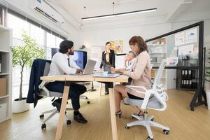 In a contemporary office, a group of senior executives with a mission to approve new projects,115 photo