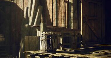 CGI Weathered wooden structures in a rustic barn illuminated by sunlight video
