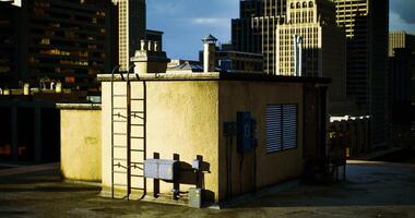 CGI Urban rooftop with ladder and utilities under sunlight in a city video
