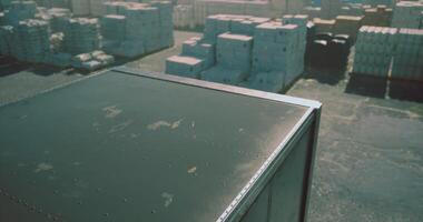 CGI Storage containers stacked at a busy shipping yard during daylight hours video