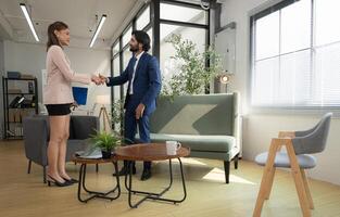 In a contemporary office, a group of senior executives with a mission to approve new projects,58 photo