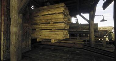 CGI Wooden planks stacked inside a rustic warehouse in broad daylight video