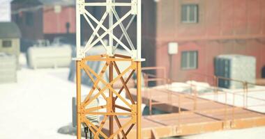 CGI Communication tower stands tall against a backdrop of rustic buildings video