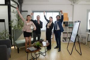 In a contemporary office, a group of senior executives with a mission to approve new projects,10 photo