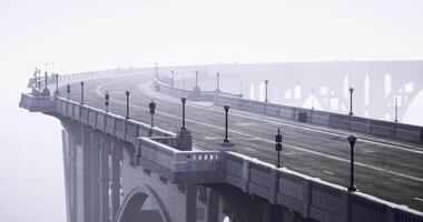 CGI Curving bridge in foggy landscape showcasing dramatic architecture and serenity video