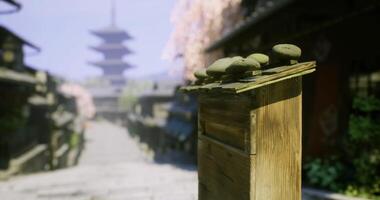 CGI Traditional wooden mailbox at a serene street in a historic town during spring video