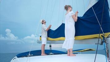 A young couple are enjoying seaside adventure aboard a yacht,47 photo
