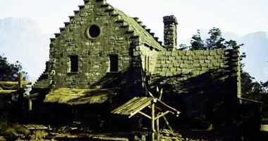 CGI Historic stone cottage nestled in a serene forest landscape at dawn video