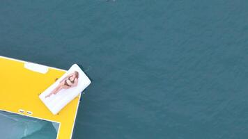 A young woman are enjoying seaside adventure aboard a yacht,24 photo