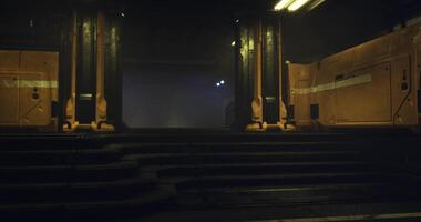 CGI Industrial hallway with illuminated steps leading to a dark area at dusk video