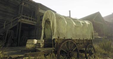 CGI Rustic wagon stands near old wooden structures in a sunlit landscape video