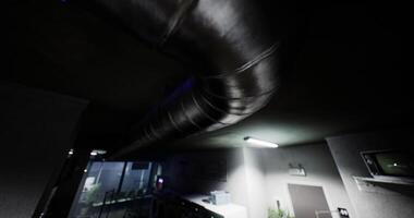 CGI Metal ductwork in an industrial area with ambient lighting and shadows video