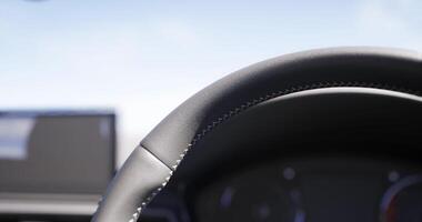 CGI Close view of car steering wheel and dashboard under clear sky video