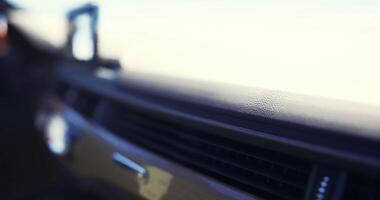 CGI Close up view of a modern car dashboard with a clear sky background video