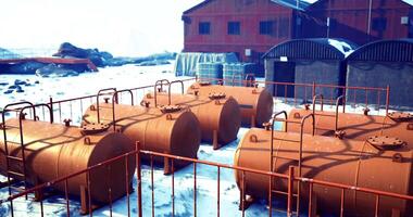 CGI Storage tanks lined up at industrial site during winter in a remote location video