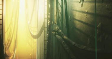 CGI Golden light filtering through hanging fabric in an urban environment video