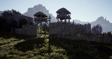CGI Historic wooden watchtowers stand guard over ancient fortress landscape video
