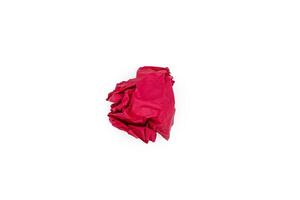 Red crumpled paper ball isolated on white. Blank for the designer. Ideas concepts with paper crumpled ball photo