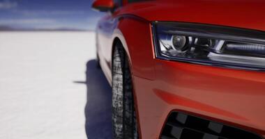 CGI Bright red car parked on a snowy surface under a clear blue sky video