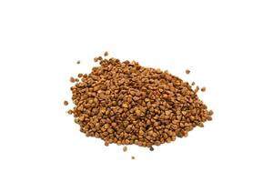 Pile of buckwheat isolated on white background photo