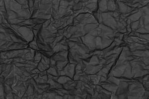 Black wrinkled paper texture. Black Paper Texture. Images for background template design photo