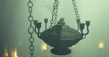CGI Intricate chandelier suspended in mysterious atmospheric lighting video