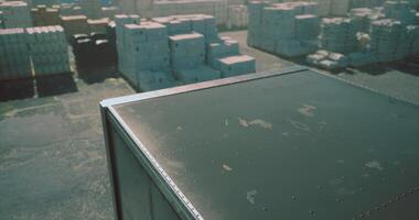 CGI Warehouse overview showcasing stored containers and pallets during daylight video