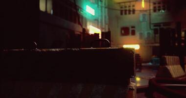 CGI Colorful neon lights illuminate dim alley in urban setting during nighttime video