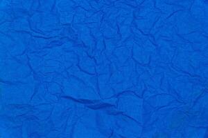 Blue crumpled paper texture background. Images for background logo text template design photo