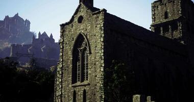 CGI Ancient stone church with gothic architecture in a serene landscape video