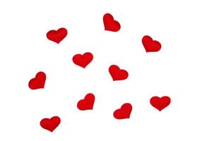 Little red hearts on a white background photo