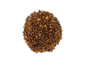 Roasted coffee beans pile isolated on white background photo