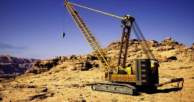 CGI Heavy machinery operates in a desert landscape for construction project video